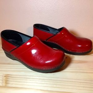 Sanita Red Patent Clogs